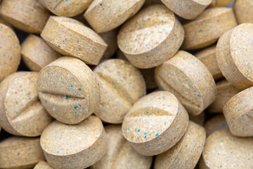 Fototapeta na wymiar Homeopathic pill supplement. Alternative Medicine. Vitamin capsules.