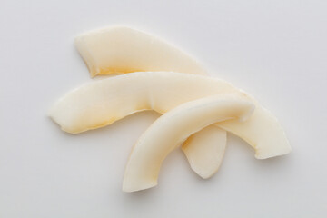 Coconut chips isolated on white background.