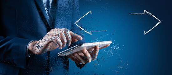 icons of arrows on opposite sides. a man holding a tablet