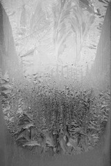 frosty pattern on the windows frost ice on glass cold background pattern