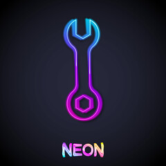 Glowing neon line Wrench spanner icon isolated on black background. Spanner repair tool. Service tool symbol. Vector