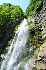 Fototapeta na wymiar The waterfall near Sutovo in Slovakia with its height of 38m. It is located in Mala Fatra.