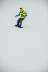 man snowboarder at ski slope
