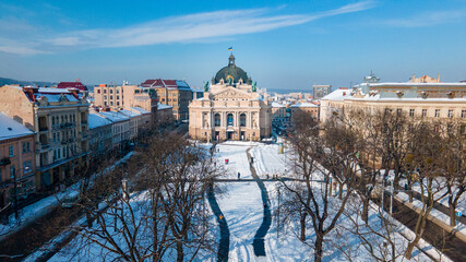 aerial view of city square in front of opera building in Lviv, sunny winter day