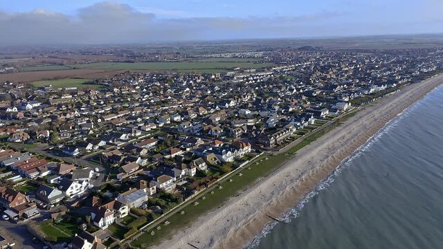 East Wittering and Bracklesham, a seaside village and resort in Southern England and popular with tourists in the summer, Aerial footage.