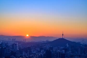 City scape night view of Seoul,Korea at sunrise time from the top of mountain