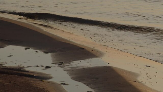Peaceful waves on a shore.