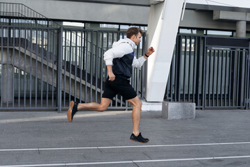 Young sportsman running fast on everyday training