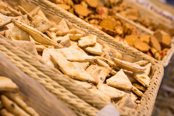 crispy cookies in wicker baskets on the counter