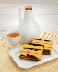Spiku or Lapis Surabaya, the Three Layers Rich Egg Yolk Cake with Strawberry Jam in Between