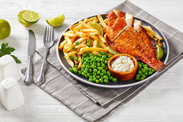fried redfish with chips, green peas, tartar sauce
