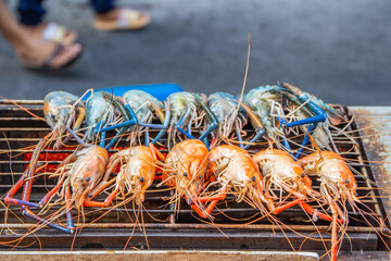 Gourmet shrimp and prawns straight from the grill at a street Market