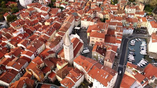 A 4K aerial footage of the Cathedral of Muggia in Italy