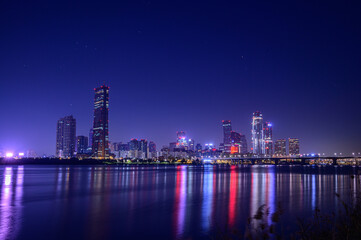 Naklejka premium Cityscape night view of Yeouido, Seoul at sunset time