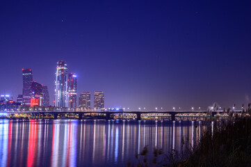 Fototapeta premium Cityscape night view of Yeouido, Seoul at sunset time