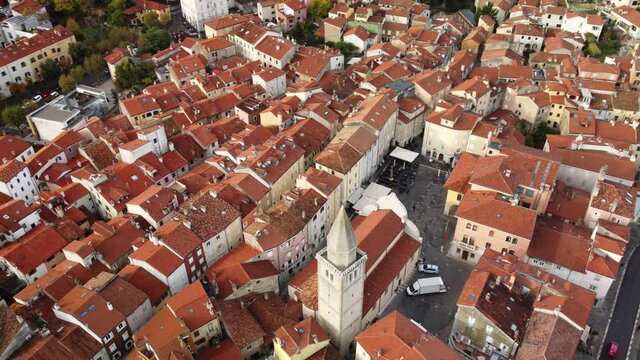 A 4K aerial footage of the Cathedral of Muggia in Italy