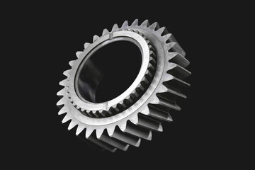 Cogwheel. Car gearbox gear. Detail of transmission of rotation of mechanisms. Black background,...