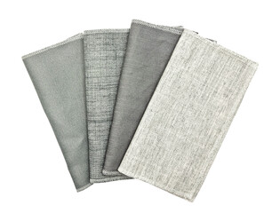 various texture of drapery fabric sample swatch in grey tone isolated on white background with clipping path. folded linen cloth swatch for selection. interior curtain material samples.