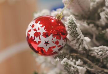Blurry of Christmas and New Year's balls with beautiful decorations on the Christmas tree, soft light, beautiful background images and illustrations.
