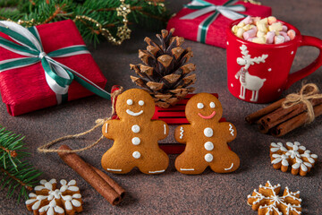 Cookies Gingerbread man on festive new year background. Homemade sweet pastries for winter holidays