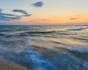 Fototapeta na wymiar Colorful dawn over the sea.