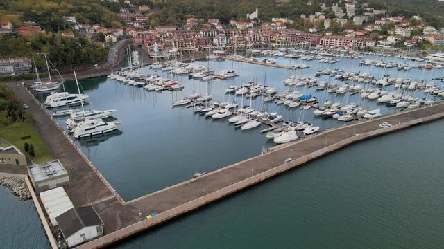 A 4K aerial view of the Porto San Rocco in Muggia, Italy