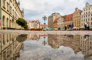 Wroclaw, Poland - due to the frequent rain, in Wroclaw you can easely find water pools, and use them to make nice shots. Here in particular the mirror effect in the Old Town