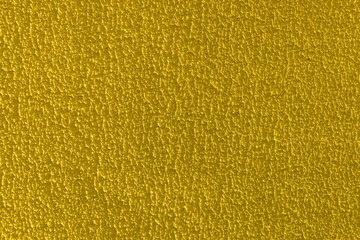 Beautiful yellow old plaster background.