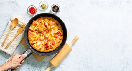 Pizza,Delicious pepperoni pizza and basil tomato cooking ingredients on black concrete background, top view of hot pepperoni pizza. With copy space for text lay flat, banner