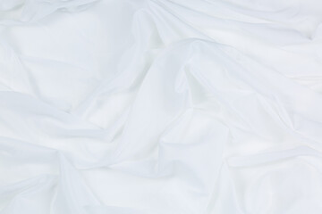 White cloth background abstract with soft waves,Closeup elegant crumpled of white silk fabric cloth background and texture. Luxury background design.
