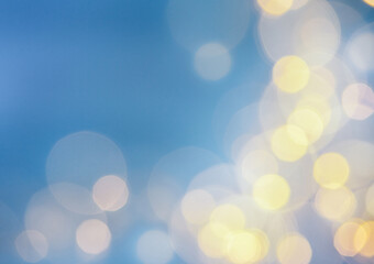 Fototapeta premium Blue background with defocused lights.