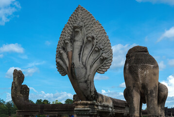 Angkor Wat, Siem Reap, Cambodia - a seven headed naga statue at the entrance of Angkor Wat