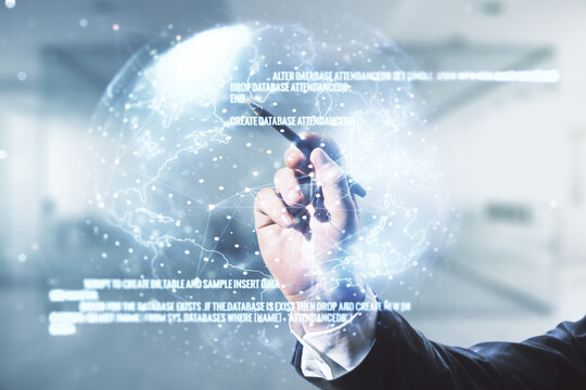 Multi exposure of programmer's hand with pen working with abstract graphic coding sketch and world map on blurred office background, big data and networking concept - Powered by Adobe