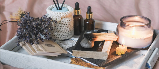 Wellness,tarot, health mental.Girl meditates yoga at home with aromatherapy palo santo Care, Wellness , meditation, spa, relax occultism, spiritual cleansing..