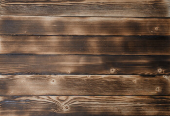 burnt old Board. Texture boards of dark brown old wood. 