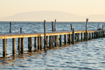 Fototapeta premium Part of old traditional wooden fishing pier in Greece