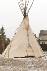 Teepee A portable dwelling of the North American Indians, a conical hut covered with buffalo or...