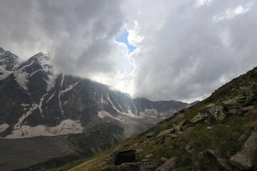 sun in the mountains