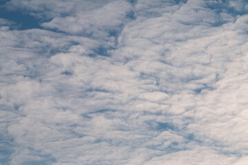 beautiful blue sky with clouds, nature background, film grain noise effect