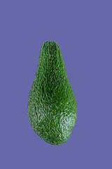 fresh avocado isolated on purple color