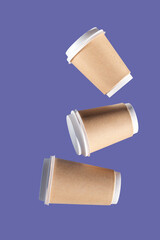 group of paper cups levitate against very peri background, greenwashing concept