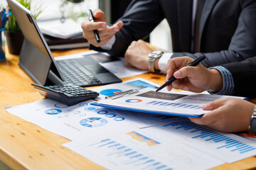 Business team present. Business man hands hold documents with financial statistic stock photo,...