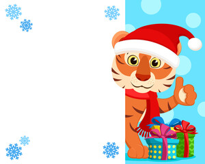 Tiger in a Christmas hat looks out, space for text. Christmas character