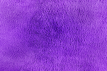 Purple carpet or fabric texture background closeup