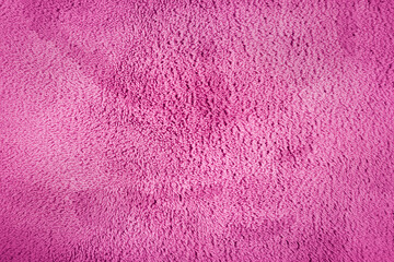 Pink carpet or fabric texture background closeup