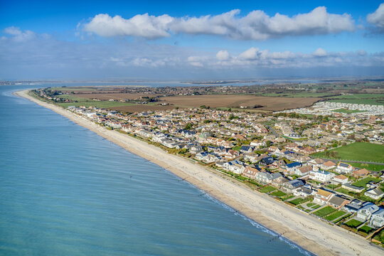 East Wittering seafront a popular resort for tourists in the summer and situated in the countryside West Sussex Southern England, Aerial photo.