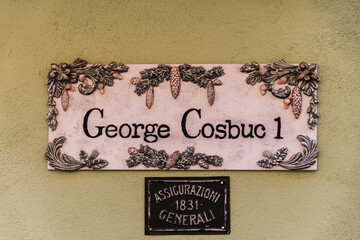 Street name sign George Cosbuc, in Brasov town, Romania.