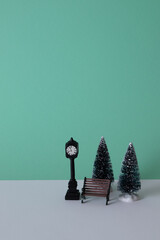 Bench under clock and trees