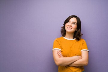 Obraz premium Cheerful woman wishing for a dream