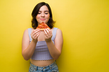 Beautiful woman craving pizza